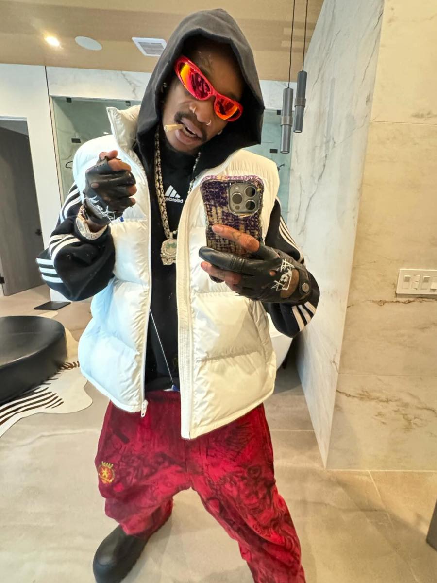 Wiz Khalifa: Red Mirrored Sunglasses, Balenciaga Puffer Vest+ Graffiti Sweatpants
