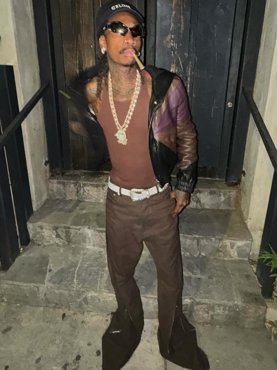 Wiz Khalifa: Black Warped Sunglasses, Leather Colorblock Jacket & Brown Zip Jeans