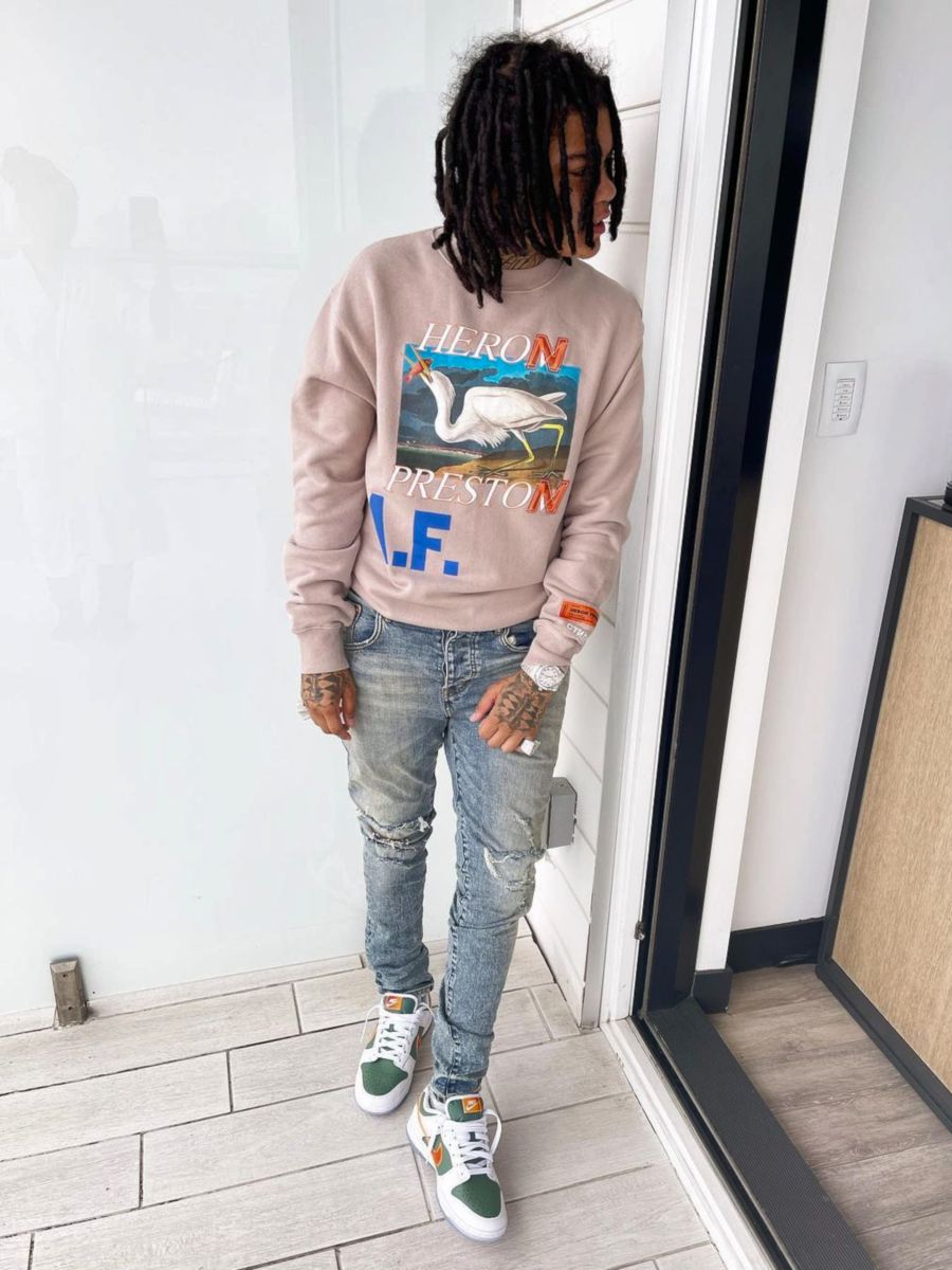 Young M.A Wearing a Heron Preston Sweatshirt With Matching Nike Dunks |  Incorporated Style