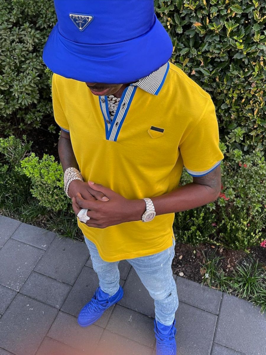Young Dolph Wearing a Prada Polo With a Matching Bucket Hat & Jordan 2s