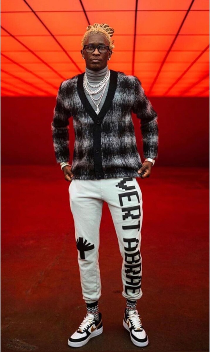 Thugger Shoots Video In 'Vert Abrae' Joggers, a Goodfight Knit, & Nike AF1s