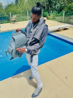 Youngboy Nba Wearing A Sxvsu Denim Hoodie With A Dior Backpack Fendi Belt And Jordan 11s
