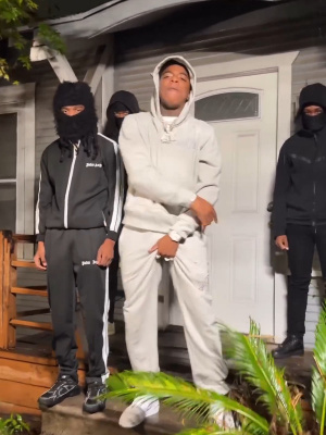 Yungeen Ace Wearing An Amiri Staggered Logo Hoodie And Sweatpants With Nike Af1s