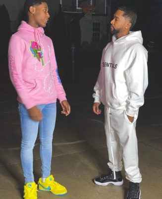 Zaytoven Wearing A Fear Of God Essentials Hoodie And Sweatpants With Black Jordans